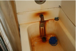 Rusty tub.MaineHousing