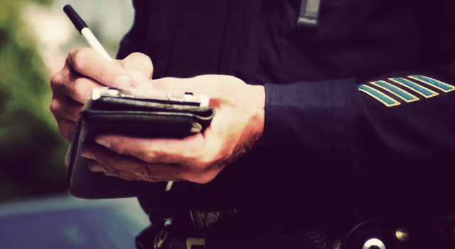 DOJ Report Accuses Ferguson Police Dept. of Acting Like “Collection Agency”