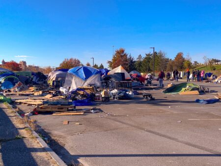 Sweep Underway at Portland’s Largest Homeless Encampment, Being Moved Below Casco Bay Bridge