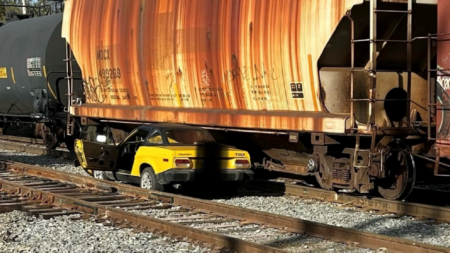 Car Struck by Train in Enfield, Driver Sustains Minor Injuries